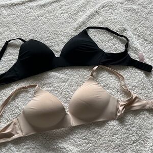Victoria's Secret Black and Cream Bras